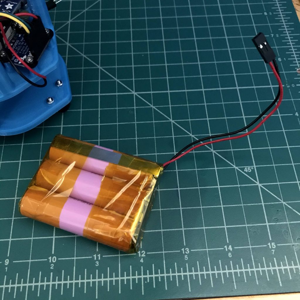 This is Frank's battery. It was made using the same techniques as the longboard battery but using a smaller BMS PCB. It's a little sketchy, but it was made with what I had. I have added a blue heat shrunk shielding around it for safety.